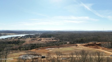 Nestled on a scenic ridge within an exclusive golf community on Tennessee National Golf Club in Tennessee - for sale on GolfHomes.com, golf home, golf lot