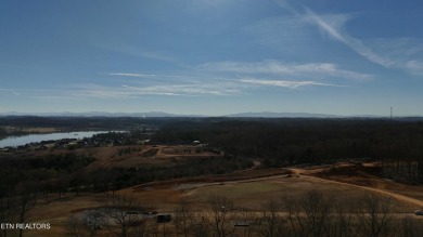Nestled on a scenic ridge within an exclusive golf community on Tennessee National Golf Club in Tennessee - for sale on GolfHomes.com, golf home, golf lot