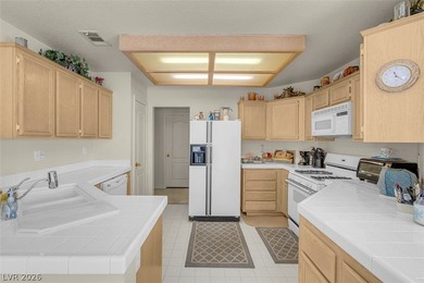 Enjoy golf course living in this single-story 2 bedroom, 2 bath on Painted Desert Golf Club in Nevada - for sale on GolfHomes.com, golf home, golf lot