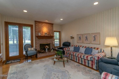 This wonderful brick, golf and waterfront home is situated on on Pinewild Country Club of Pinehurst in North Carolina - for sale on GolfHomes.com, golf home, golf lot