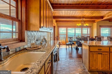 Indulge in breathtaking views from the moment you step foot in on Mountain Harbour Golf Club in North Carolina - for sale on GolfHomes.com, golf home, golf lot