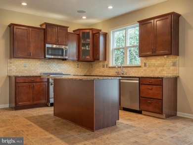 Welcome to 106 Lawrence Dr - Where Elegance Meets Comfort in on Bella Vista Golf Course, Ltd in Pennsylvania - for sale on GolfHomes.com, golf home, golf lot