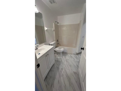 Under contract-accepting backup offers. Welcome to resort-style on Southern Dunes Golf and Country Club in Florida - for sale on GolfHomes.com, golf home, golf lot