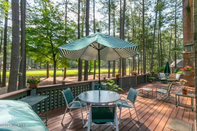 This wonderful brick, golf and waterfront home is situated on on Pinewild Country Club of Pinehurst in North Carolina - for sale on GolfHomes.com, golf home, golf lot