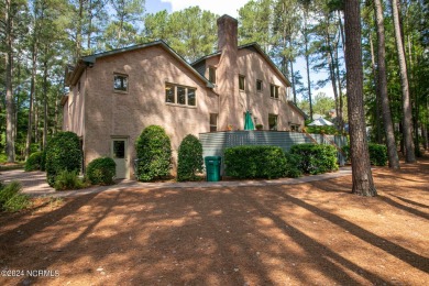 This wonderful brick, golf and waterfront home is situated on on Pinewild Country Club of Pinehurst in North Carolina - for sale on GolfHomes.com, golf home, golf lot