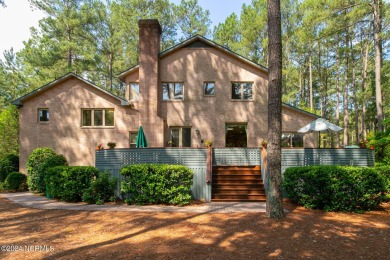 This wonderful brick, golf and waterfront home is situated on on Pinewild Country Club of Pinehurst in North Carolina - for sale on GolfHomes.com, golf home, golf lot