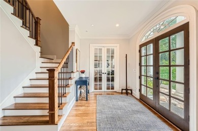 Nestled on a spacious meticulously landscaped site in East Cobbs on Atlanta Country Club in Georgia - for sale on GolfHomes.com, golf home, golf lot