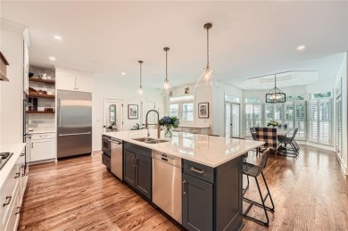 Nestled on a spacious meticulously landscaped site in East Cobbs on Atlanta Country Club in Georgia - for sale on GolfHomes.com, golf home, golf lot