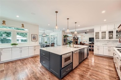 Nestled on a spacious meticulously landscaped site in East Cobbs on Atlanta Country Club in Georgia - for sale on GolfHomes.com, golf home, golf lot