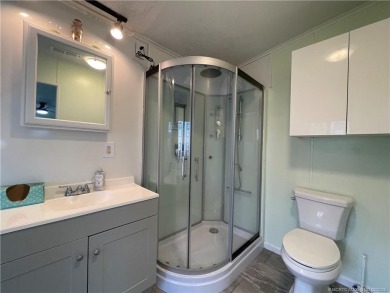 Make this lovely home yours with plenty of room for friends & on Indianwood Golf and Country Club in Florida - for sale on GolfHomes.com, golf home, golf lot
