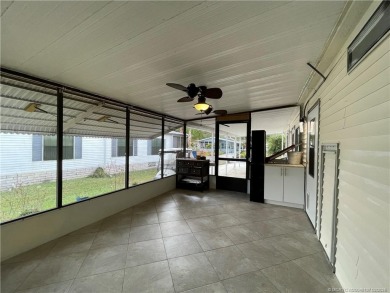 Make this lovely home yours with plenty of room for friends & on Indianwood Golf and Country Club in Florida - for sale on GolfHomes.com, golf home, golf lot