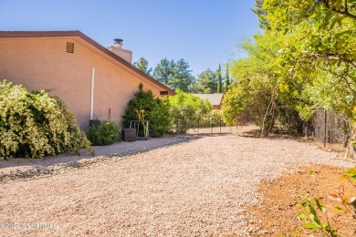 Welcome to this beautifully updated 3-bedroom, 2-bath home in on Oakcreek Country Club in Arizona - for sale on GolfHomes.com, golf home, golf lot