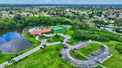 Rare First-Floor Corner Unit in The Coves of Aberdeen East! This on The Links At Boynton Beach - The Family Course in Florida - for sale on GolfHomes.com, golf home, golf lot