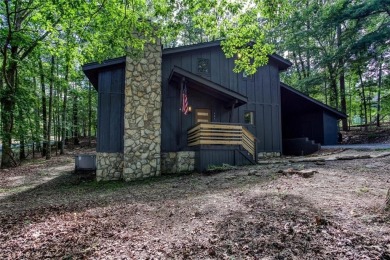 Nestled on a desirable corner lot near the North Gate, this on The Highlands Course at Lake Arrowhead in Georgia - for sale on GolfHomes.com, golf home, golf lot