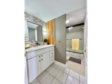 BREATHTAKING WATER VIEWS from this elegant 11th-floor corner-end on Pasadena Yacht and Country Club in Florida - for sale on GolfHomes.com, golf home, golf lot