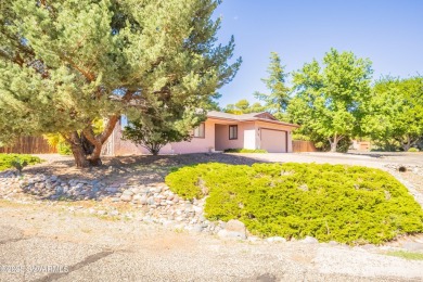 Welcome to this beautifully updated 3-bedroom, 2-bath home in on Oakcreek Country Club in Arizona - for sale on GolfHomes.com, golf home, golf lot