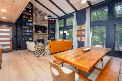 Nestled on a desirable corner lot near the North Gate, this on The Highlands Course at Lake Arrowhead in Georgia - for sale on GolfHomes.com, golf home, golf lot