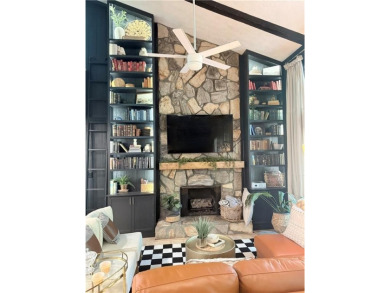 Nestled on a desirable corner lot near the North Gate, this on The Highlands Course at Lake Arrowhead in Georgia - for sale on GolfHomes.com, golf home, golf lot