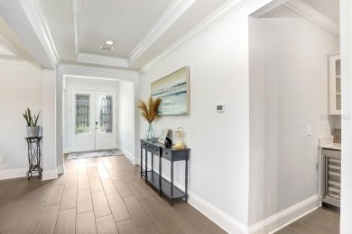 Enjoy stunning sunset views over a serene pond from the comfort on Cheval Golf and Country Club in Florida - for sale on GolfHomes.com, golf home, golf lot