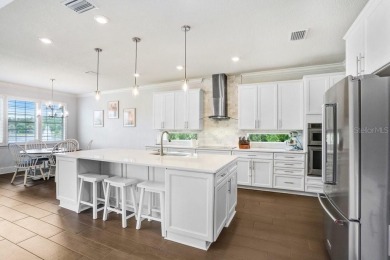 Enjoy stunning sunset views over a serene pond from the comfort on Cheval Golf and Country Club in Florida - for sale on GolfHomes.com, golf home, golf lot