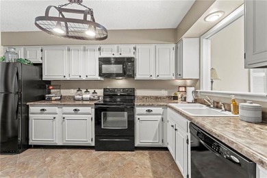 WELCOME TO YOUR MAINTENANCE PROVIDED TOWNHOME at Mission on Minor Park Golf Course in Missouri - for sale on GolfHomes.com, golf home, golf lot