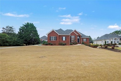 This all-brick home truly checks every box--main-level living on Oak Mountain Championship Golf Club in Georgia - for sale on GolfHomes.com, golf home, golf lot