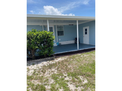 Welcome to your dream retreat! This cute Little Blue Cottage is on Blue Heron Pines Golf Course in Florida - for sale on GolfHomes.com, golf home, golf lot