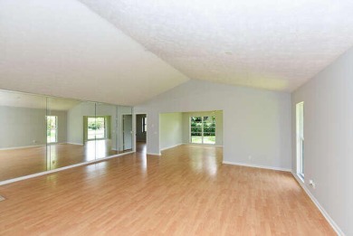 Priced to sell AS-IS. Great condition, just needs your own on Eagle Wood Golf Course in Florida - for sale on GolfHomes.com, golf home, golf lot