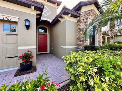 Under contract-accepting backup offers. New reduced price! on The Oasis Club at Champions Gate in Florida - for sale on GolfHomes.com, golf home, golf lot