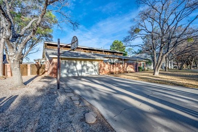 AN ABSOLUTE STUNNER LOCATED ON A TREE-LINED CUL-DE-SAC! A MODERN on Green Tree Country Club in Texas - for sale on GolfHomes.com, golf home, golf lot