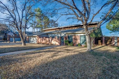 AN ABSOLUTE STUNNER LOCATED ON A TREE-LINED CUL-DE-SAC! A MODERN on Green Tree Country Club in Texas - for sale on GolfHomes.com, golf home, golf lot