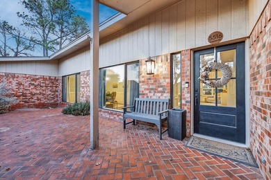 AN ABSOLUTE STUNNER LOCATED ON A TREE-LINED CUL-DE-SAC! A MODERN on Green Tree Country Club in Texas - for sale on GolfHomes.com, golf home, golf lot