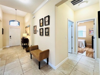 Under contract-accepting backup offers. New reduced price! on The Oasis Club at Champions Gate in Florida - for sale on GolfHomes.com, golf home, golf lot