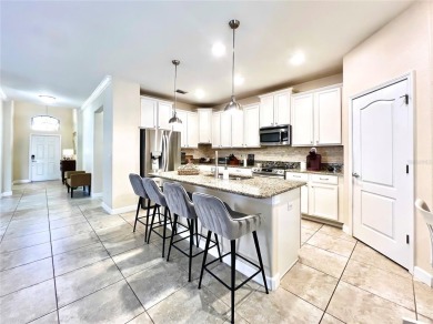 Under contract-accepting backup offers. New reduced price! on The Oasis Club at Champions Gate in Florida - for sale on GolfHomes.com, golf home, golf lot