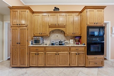 Get your golf clubs ready and settle into refined comfort just on Ridgewood Country Club in Texas - for sale on GolfHomes.com, golf home, golf lot