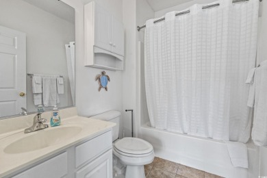 Enjoy resort-style living in this fully furnished 2-bedroom on Barefoot Resort and Golf Club  in South Carolina - for sale on GolfHomes.com, golf home, golf lot