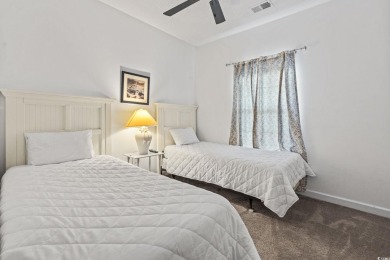 Enjoy resort-style living in this fully furnished 2-bedroom on Barefoot Resort and Golf Club  in South Carolina - for sale on GolfHomes.com, golf home, golf lot