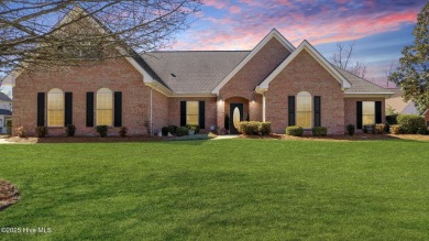 Experience luxury living in this exquisite home nestled in the on Sound Golf Links at Albemarle Plantation in North Carolina - for sale on GolfHomes.com, golf home, golf lot