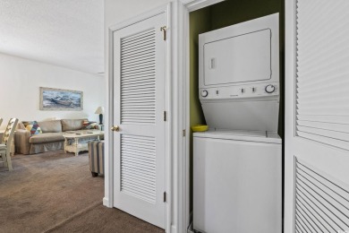 Enjoy resort-style living in this fully furnished 2-bedroom on Barefoot Resort and Golf Club  in South Carolina - for sale on GolfHomes.com, golf home, golf lot