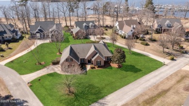 Experience luxury living in this exquisite home nestled in the on Sound Golf Links at Albemarle Plantation in North Carolina - for sale on GolfHomes.com, golf home, golf lot