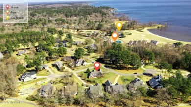 Experience luxury living in this exquisite home nestled in the on Sound Golf Links at Albemarle Plantation in North Carolina - for sale on GolfHomes.com, golf home, golf lot