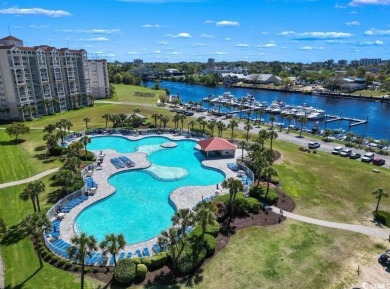 Enjoy resort-style living in this fully furnished 2-bedroom on Barefoot Resort and Golf Club  in South Carolina - for sale on GolfHomes.com, golf home, golf lot
