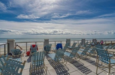 Enjoy resort-style living in this fully furnished 2-bedroom on Barefoot Resort and Golf Club  in South Carolina - for sale on GolfHomes.com, golf home, golf lot