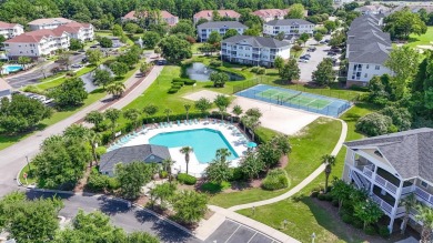 Enjoy resort-style living in this fully furnished 2-bedroom on Barefoot Resort and Golf Club  in South Carolina - for sale on GolfHomes.com, golf home, golf lot