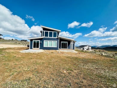 Come relax on this beautiful top deck overlooking the valley and on Bear Lake Golf Course in Utah - for sale on GolfHomes.com, golf home, golf lot