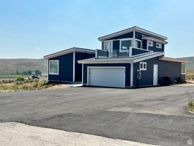 Come relax on this beautiful top deck overlooking the valley and on Bear Lake Golf Course in Utah - for sale on GolfHomes.com, golf home, golf lot