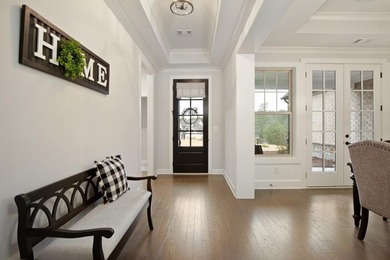 Introducing this stunning cul-de-sac beauty in the sought-after on The Governors Towne Club in Georgia - for sale on GolfHomes.com, golf home, golf lot