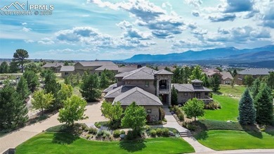 Discover luxury living in this beautifully crafted custom home on The Club At Flying Horse in Colorado - for sale on GolfHomes.com, golf home, golf lot