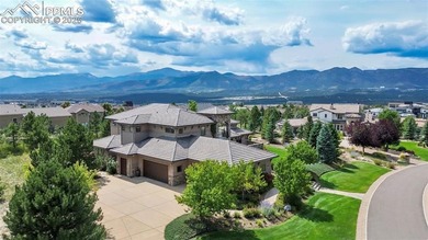 Discover luxury living in this beautifully crafted custom home on The Club At Flying Horse in Colorado - for sale on GolfHomes.com, golf home, golf lot