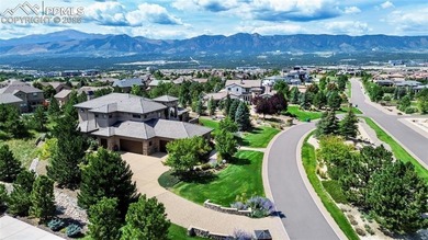 Discover luxury living in this beautifully crafted custom home on The Club At Flying Horse in Colorado - for sale on GolfHomes.com, golf home, golf lot